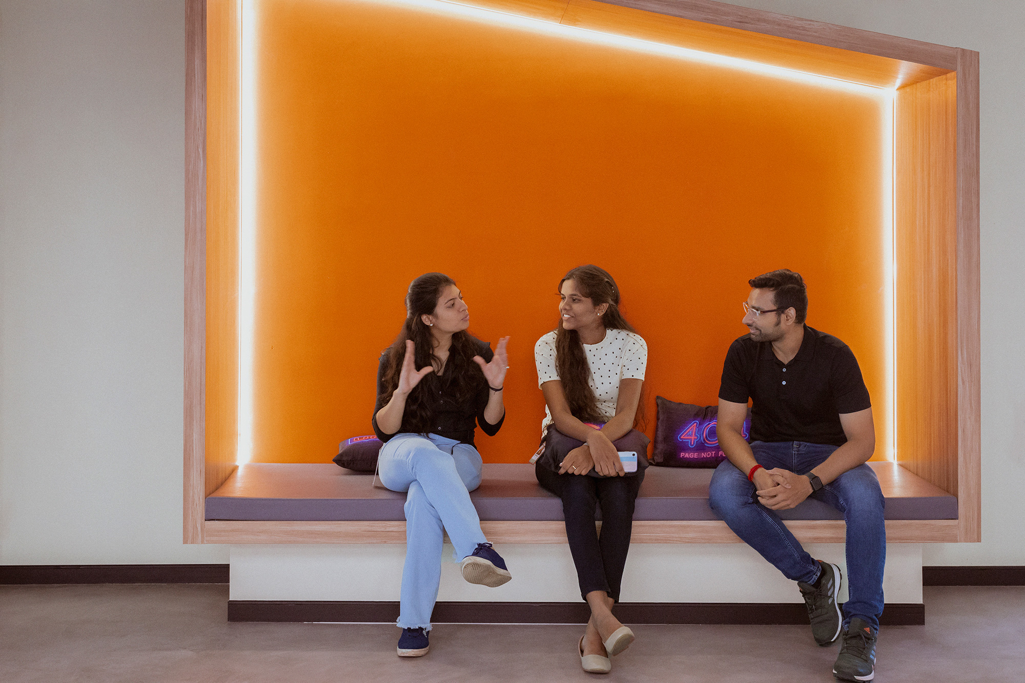 a group of people sitting on a bench