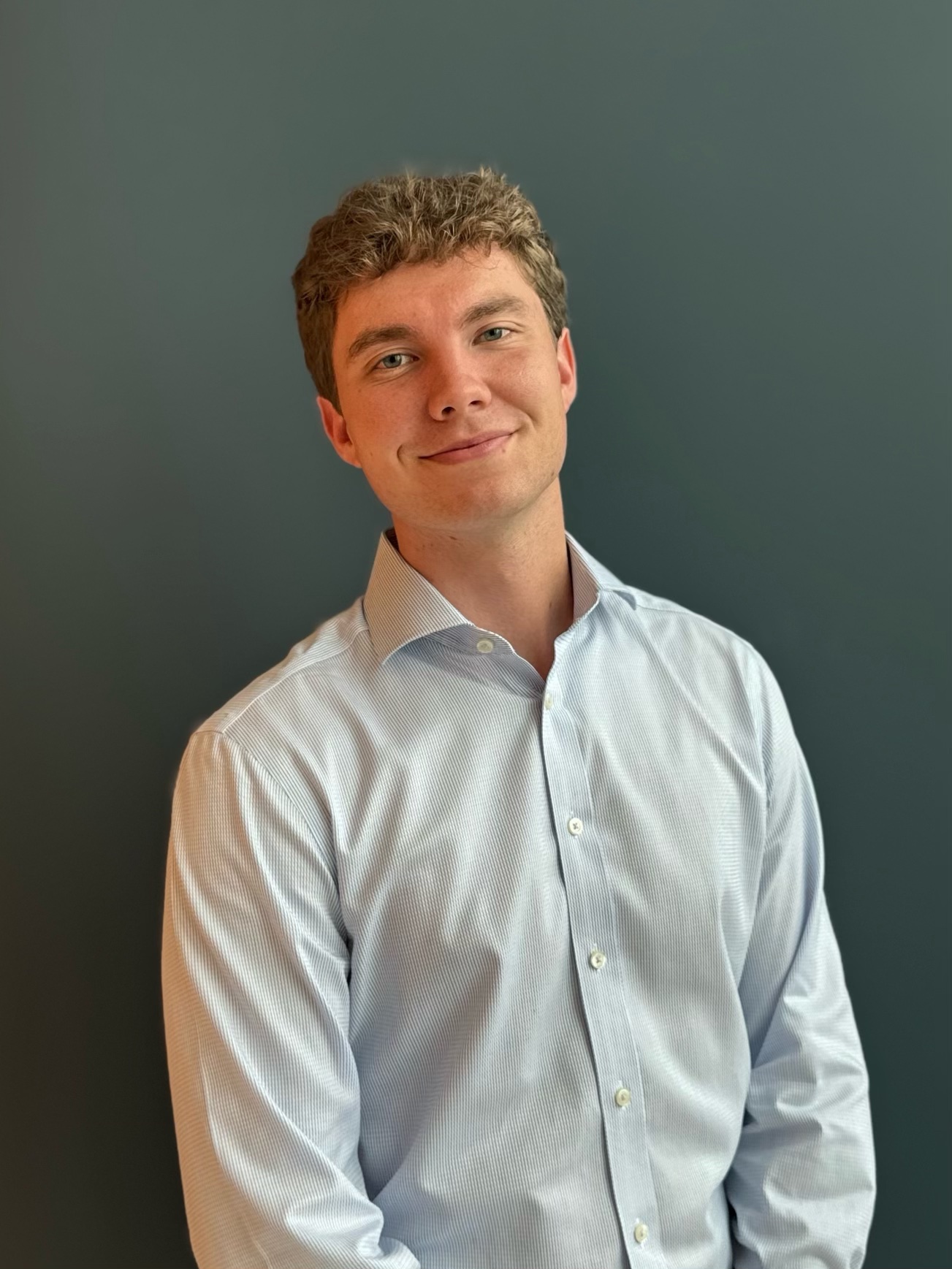 a person smiling at the camera