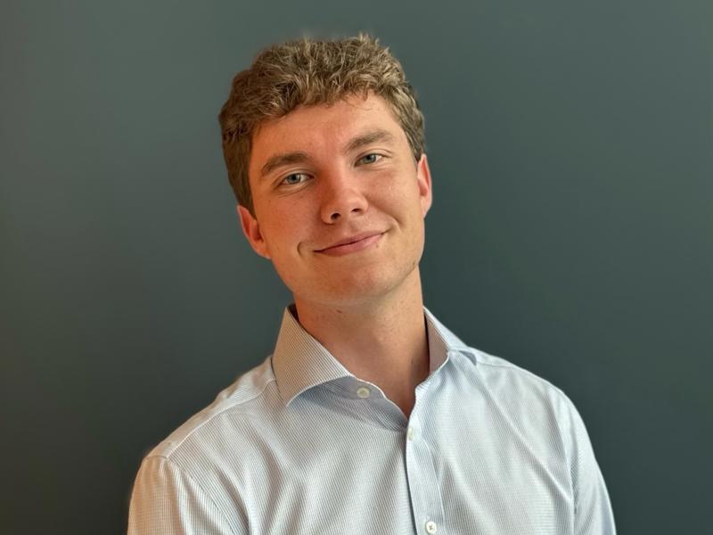 a person smiling at the camera