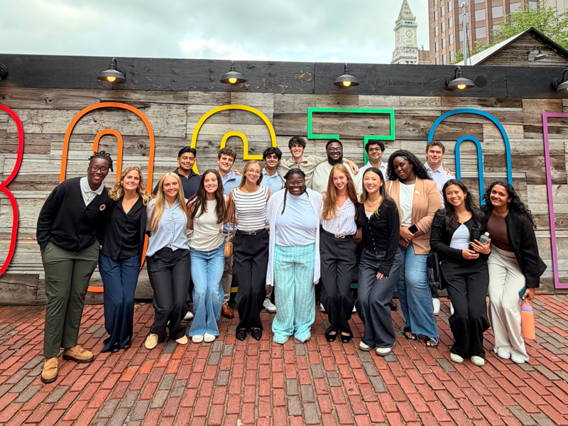 a group of people posing for a photo