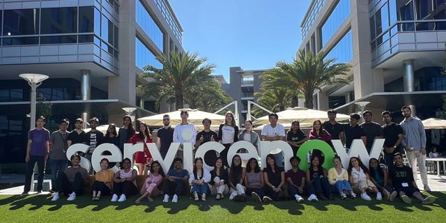 a group of people posing for a photo
