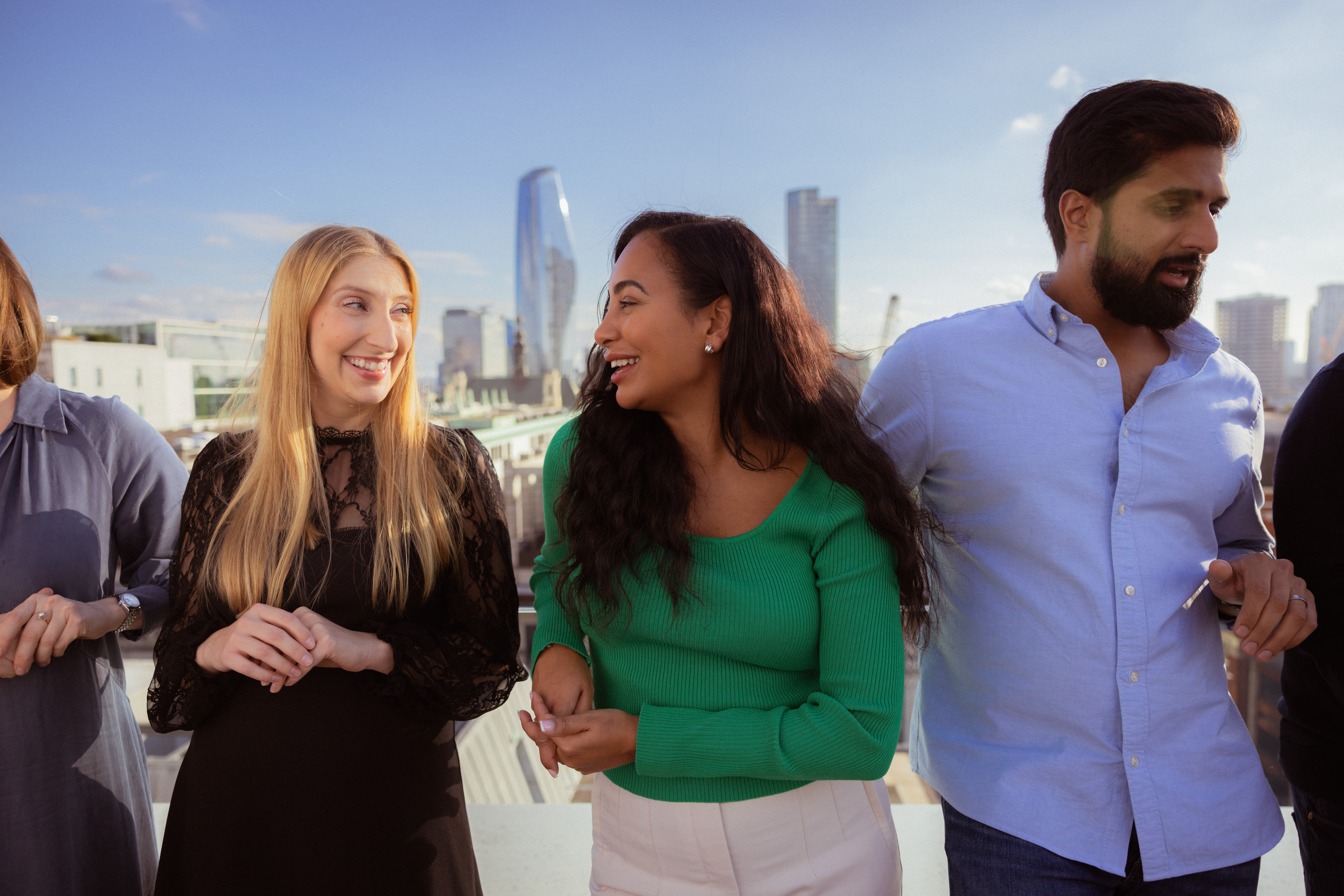 a group of people standing on a rooftop