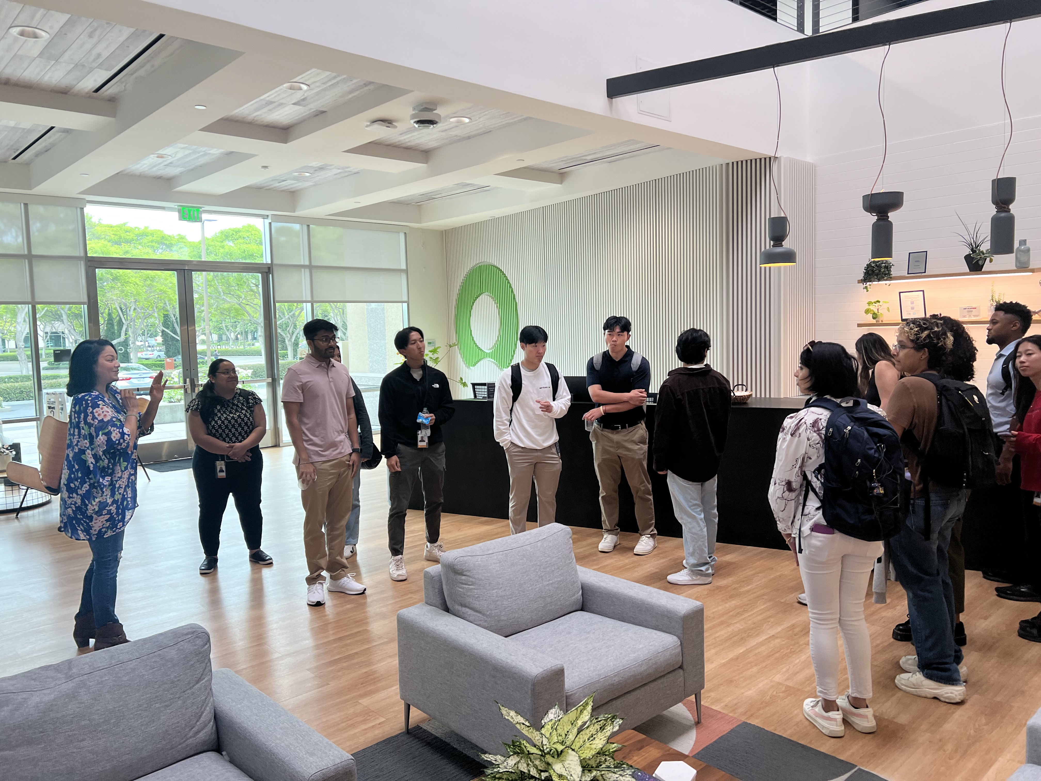 a group of people standing in a room