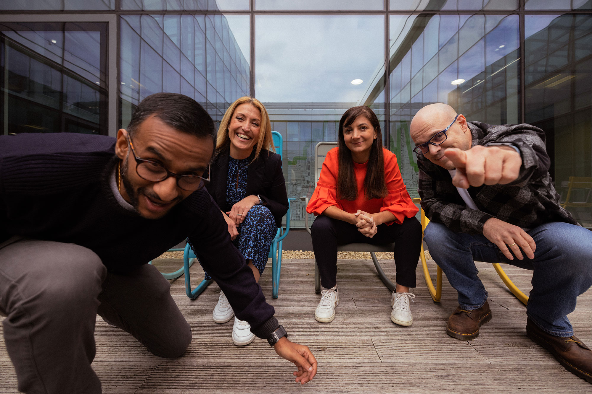 a group of people sitting on chairs