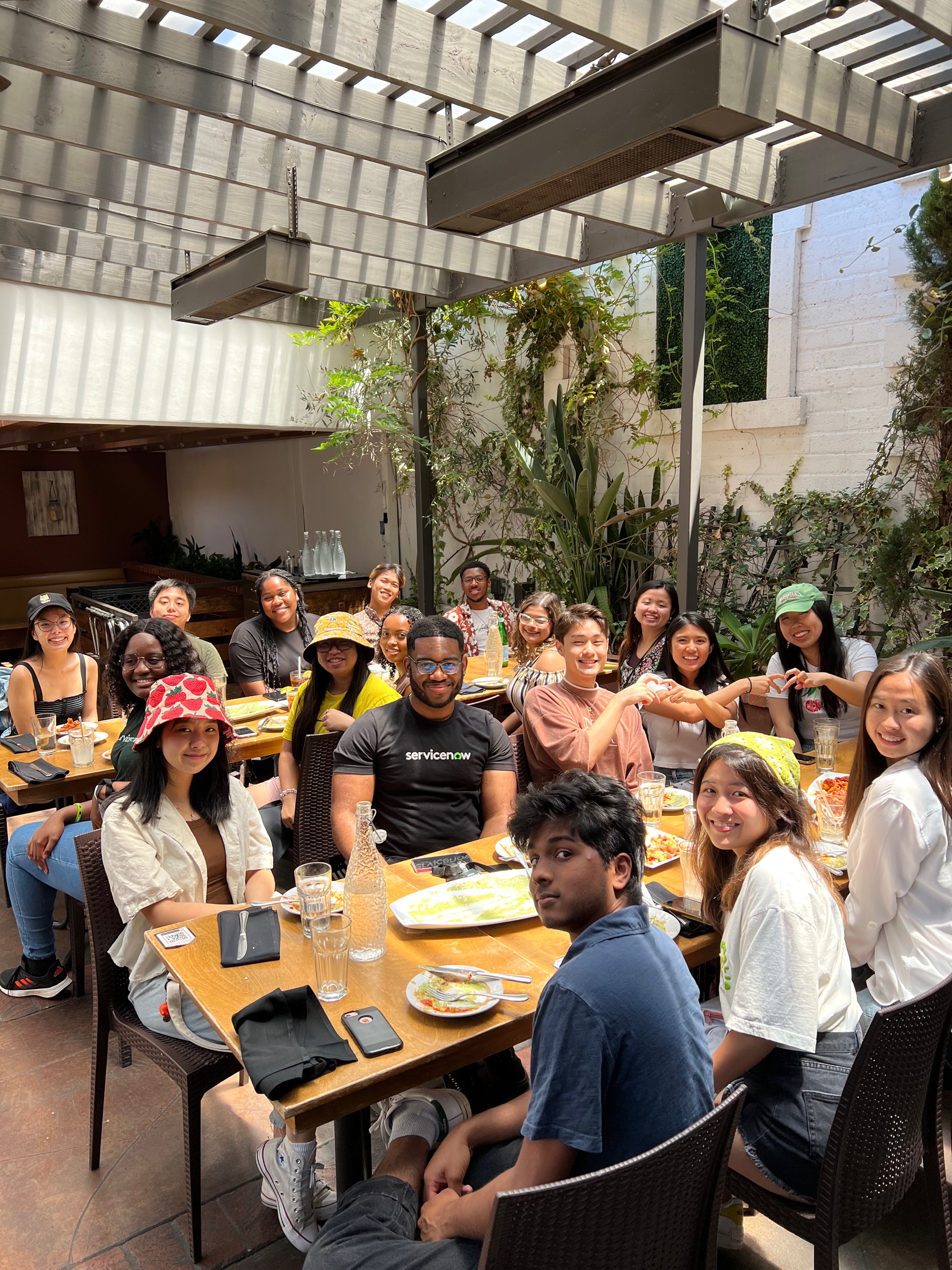 a group of people sitting at tables