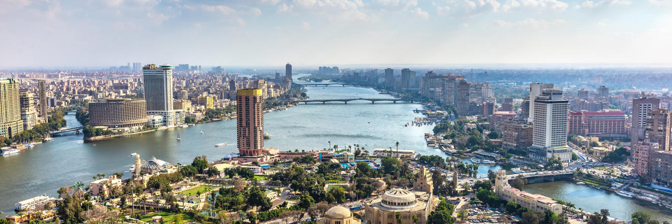 a city with a river and buildings