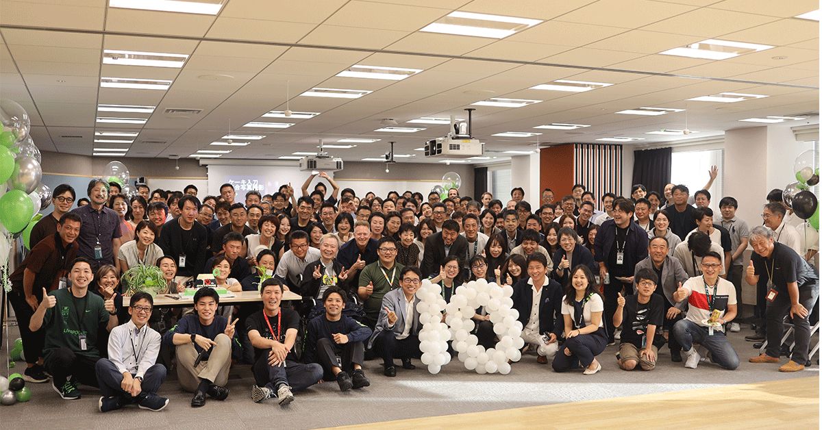 a group of people posing for a photo