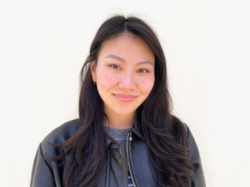 a person smiling at the camera