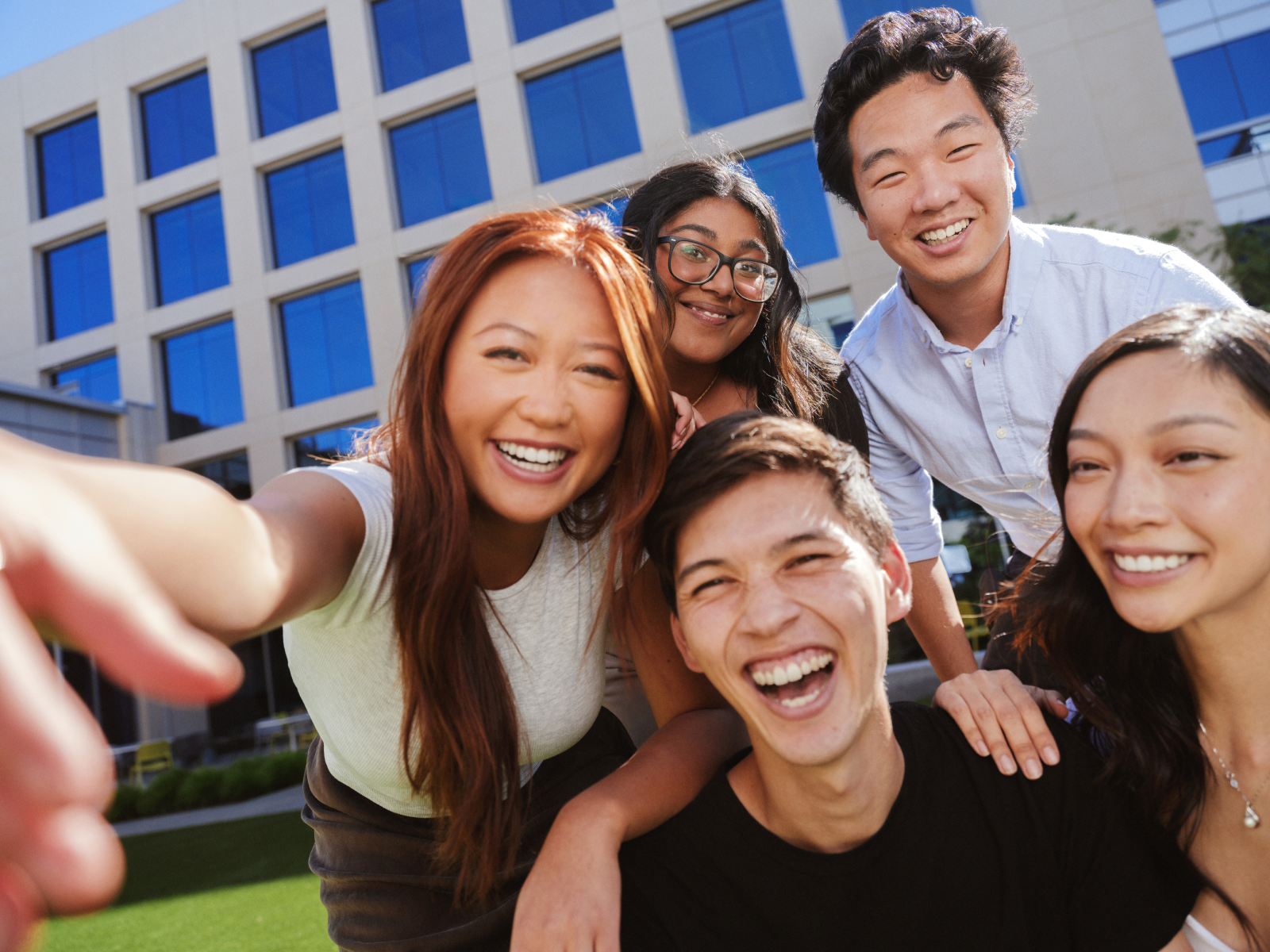 a group of people posing for a photo