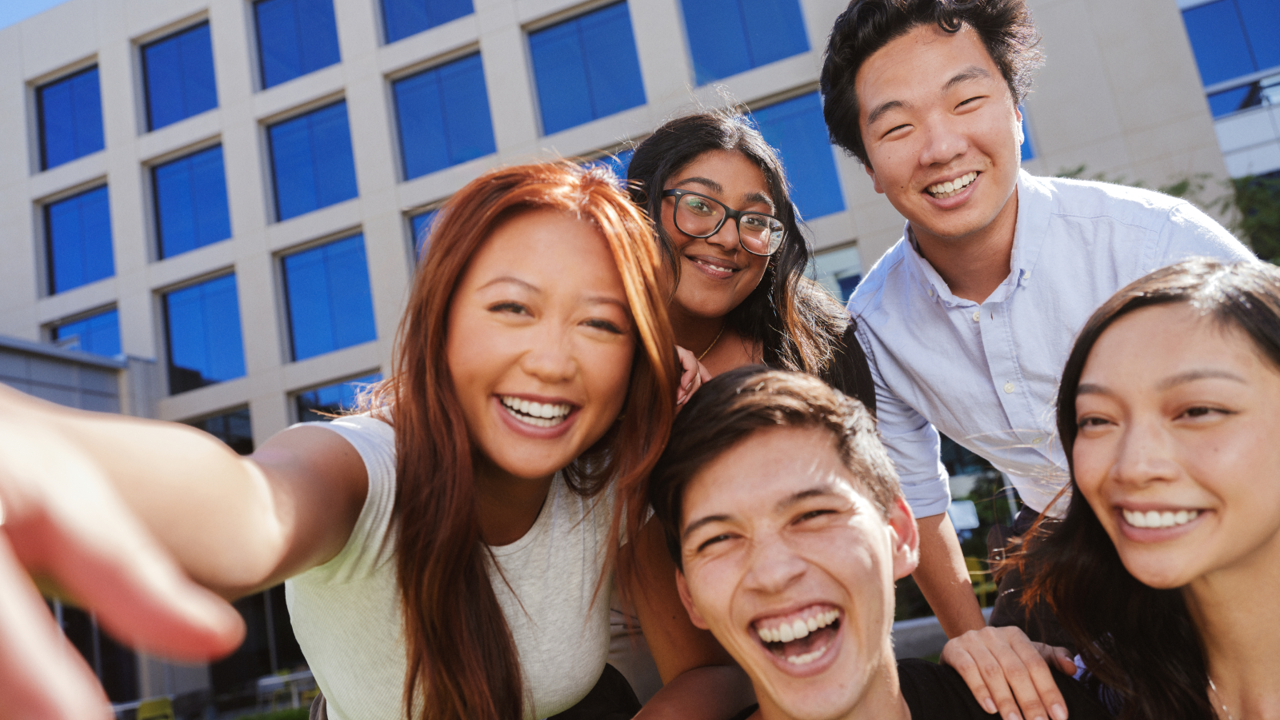 a group of people posing for a photo