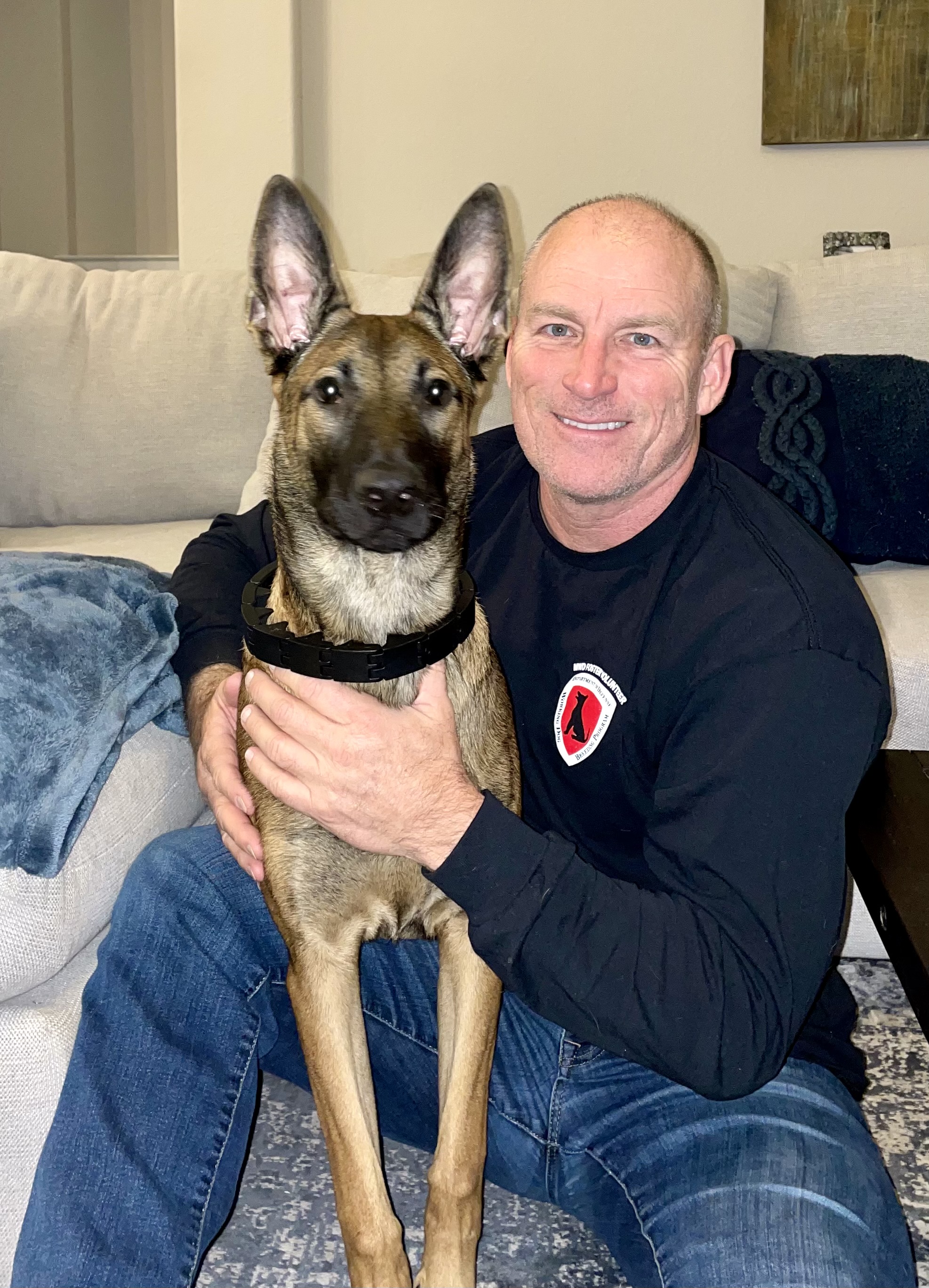 a person holding a dog