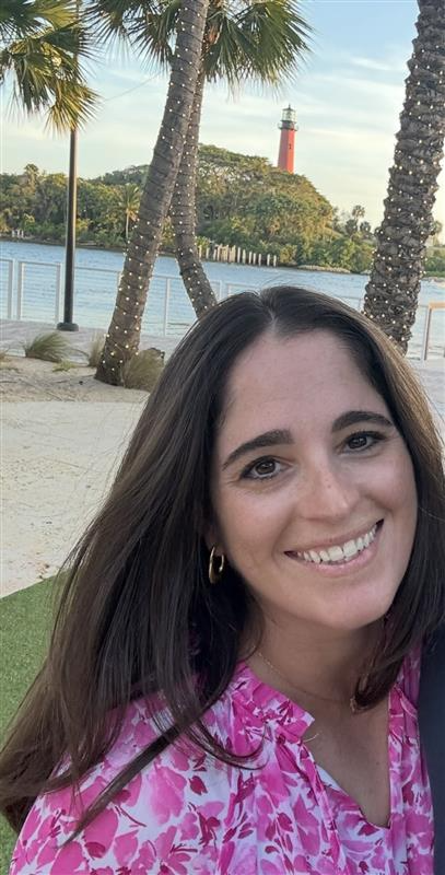 a person smiling at the camera