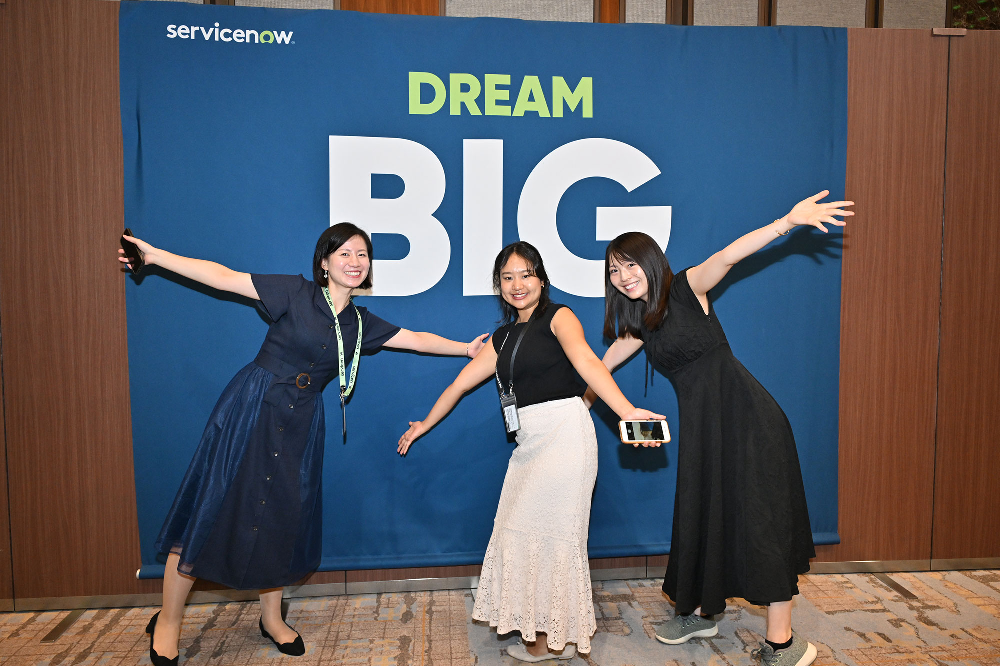 a group of women posing for a photo