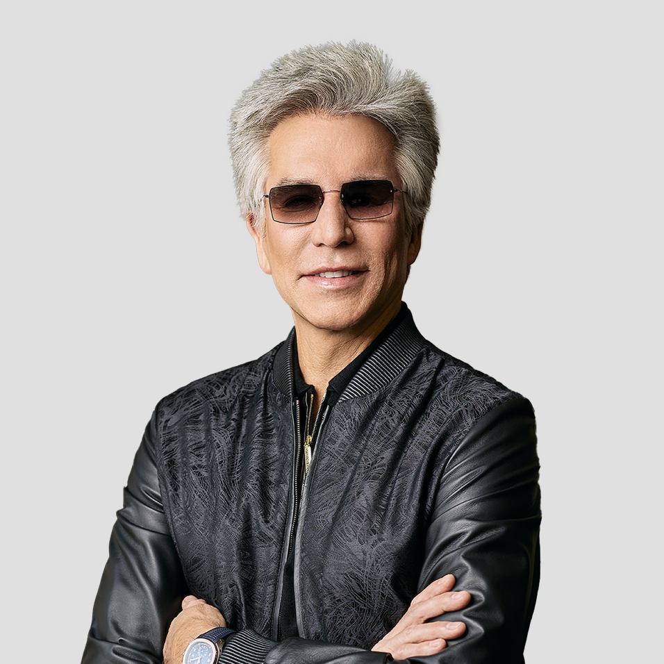 Bill McDermott wearing sunglasses and a black jacket