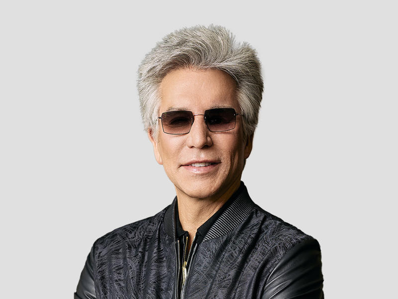 Bill McDermott wearing sunglasses and a black jacket