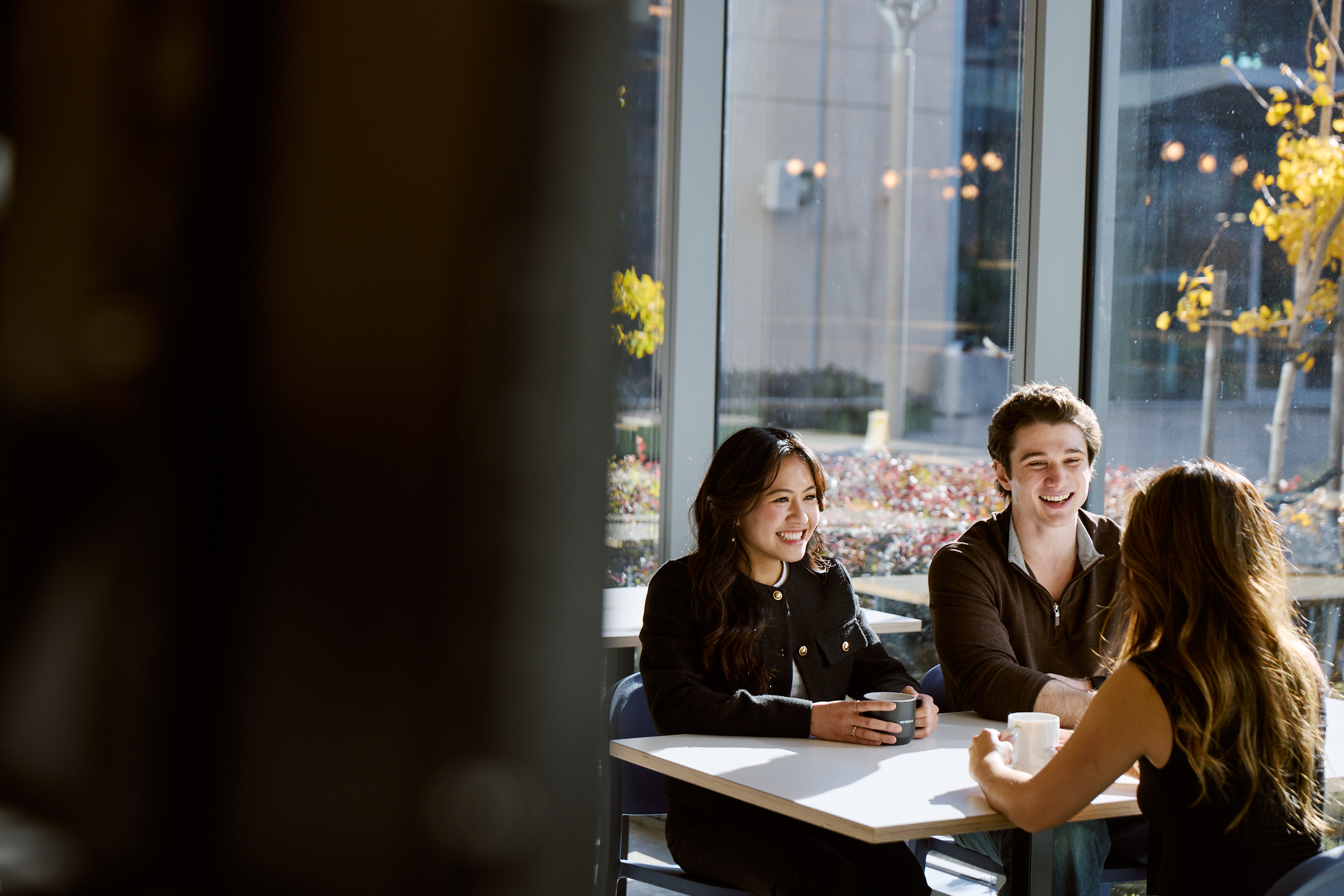 a group of people sitting at a table